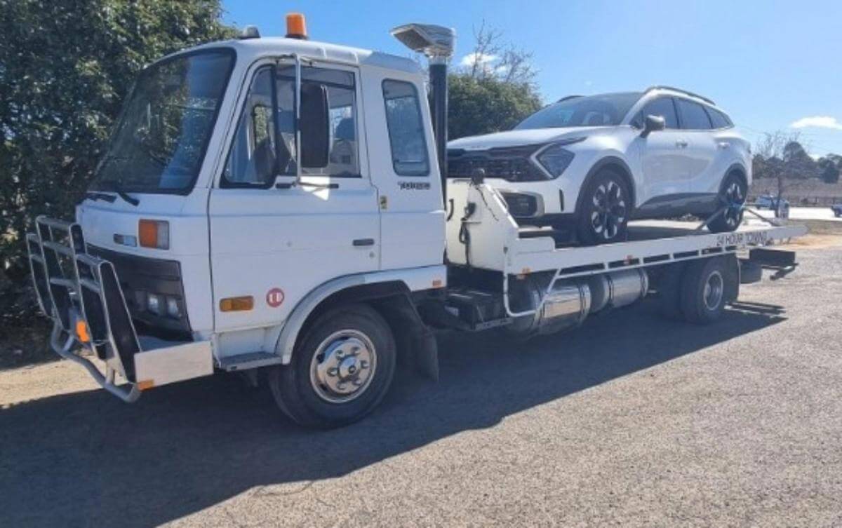 Tow Truck with  13 TILT plates.