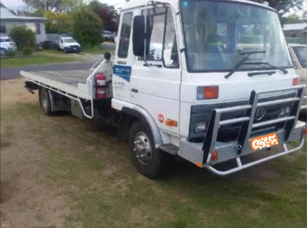 Tow Truck with  13 TILT plates.